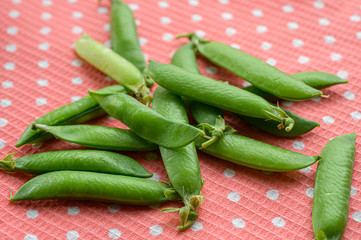 Natural looking fresh green pea. Macro with shallow depth of field.