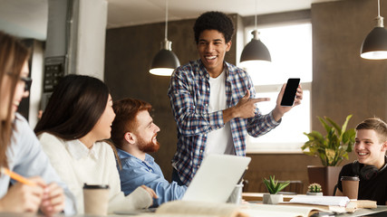 Obraz premium Multiethnic students doing research in library together