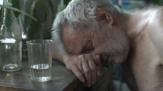 Drunkard sleeping at the table