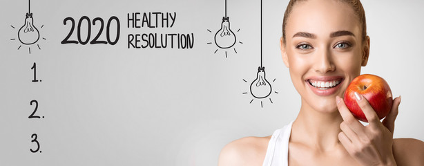 2020 Healthy Resolution with blank checklist and happy woman
