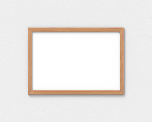 Horizontal wooden frames mockup hanging on the wall. Empty base for picture or text. 3D rendering.