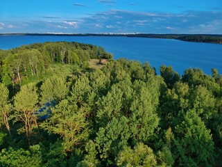 Fototapeta na wymiar Aerial view of the lake and islands near Yunost sanatorium in Honoles, Minsk Region of Belarus