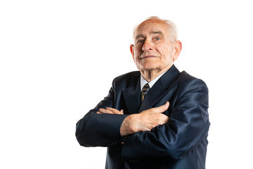 Portrait of 90 year serious handsome senior man with crossed hands portrait isolated on white background. Free space