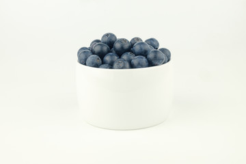 beautiful blueberry on white bowl