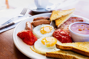 Egg and Toast - classical english breakfast with egg and ham