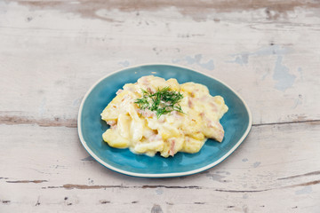 Gratin Of Potatoes, Ham, Eggs And Onions