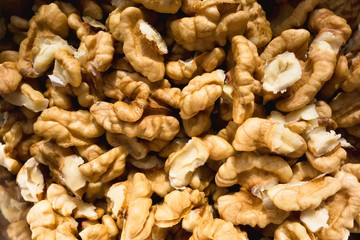 Peeled / shelled walnuts. Closeup / macro photography. Walnuts are a great source of high concentrations of fat, vitamin B, zinc, copper and manganese.