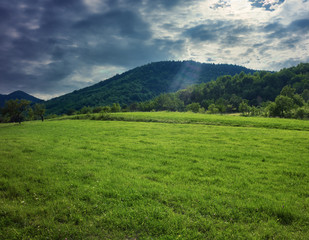 Fototapeta na wymiar Dramatic Sky On rural Landscape of Romania