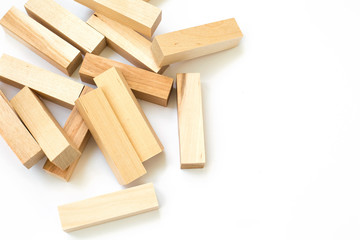 Wooden game bars on white isolated background close up
