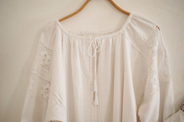 Old white linen shirt. The national dress of the Cossacks. Simple fabrics , ethnics.