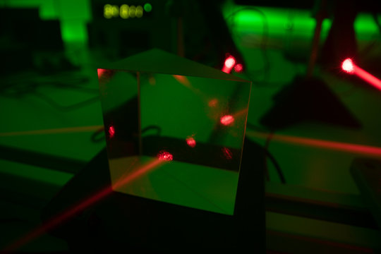 Experiment with a red laser in a physics lab