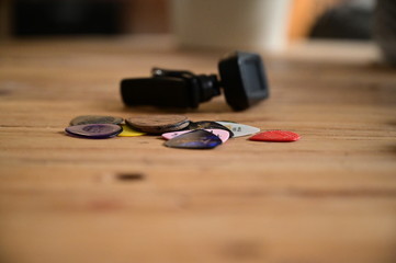 Guitar tuner and an assortment of guitar picks