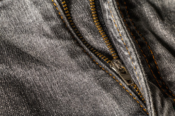 Close-up gray jeans detail, high resolution texture