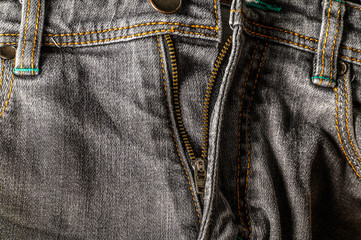 Close-up gray jeans detail, high resolution texture