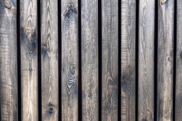 Wood fence. Vertical wooden board. Fence vertical wooden.