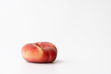 Fototapeta na wymiar Fresh organic saturn peaches