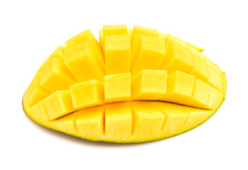 Mango cubes. Isolated on a white background. Close-up.