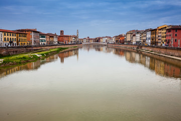 Fototapeta na wymiar View of the Arno River and Pisa city