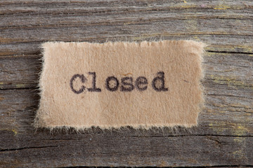 Closed sign - printed with typescript on a piece of paper