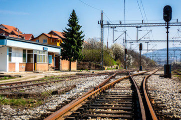 Fototapeta na wymiar Train rails and train station