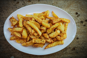 Crispy French Fries on Plate: A delectable serving of golden, crispy French fries artfully arranged...