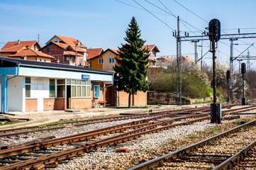 Fototapeta na wymiar Train rails and train station