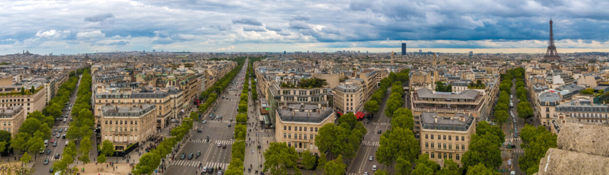 Huge aerial panorama picture of the Paris cityscape with Montmartre, Sacré-Cœur, Tour Montparnasse and Eiffel Tower including Avenue de Friedland, Av. des Champs-Élysées, Av. Marceau and Av. d'Iéna.