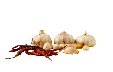 Garlic heads and red dried chilies are food ingredients. On a white background - images