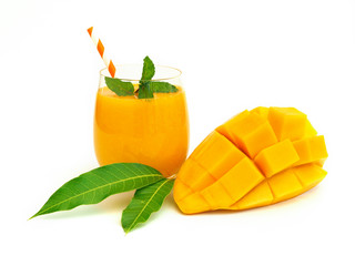 Fresh mango smoothies glass and ripe mango on white background for healthy summer drinks concept.