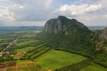 Fototapeta premium Aerial view. High mountain views and the verdant farmland of the countryside In Sa Kaeo, Thailand
