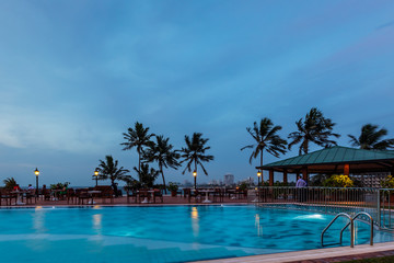Fototapeta na wymiar Sunset viewed at a swimming pool, Mount Lavinia, Sri Lanka