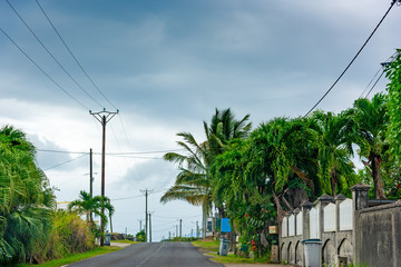 Dark clouds over a small road in Guadeloupe