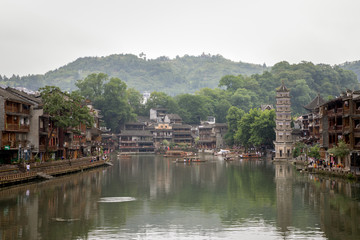 Fototapeta na wymiar Fenghuang Old Town or Phoenix Town with the river cross through and traditional buildings, West Hunan, China. Hometown of famous novelist Shen Congwen.