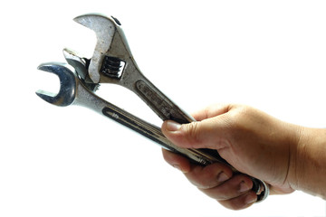 isolated A hand of repairman holding wrenches, on white background, close-up