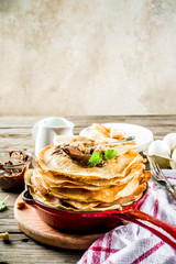 Homemade crepes with chocolate sauce