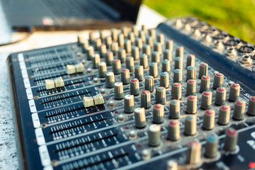 Dj mixer close up. Useful for various music and sound themes.