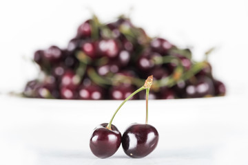 selective focus of red, fresh and sweet cherries