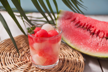 Fruit salad with melon and watermelon balls in glass