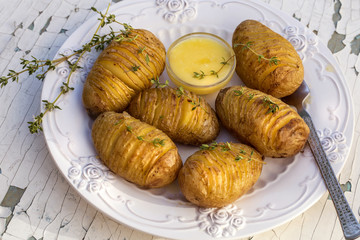 grilled potatoes with cream sauce and thyme