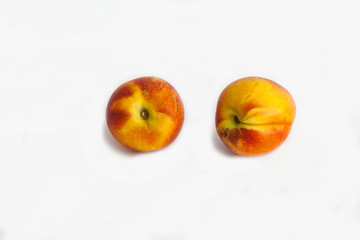 Nectarines on white background