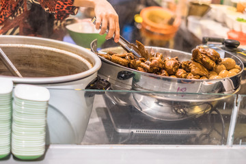 Pot-stewed duck selling on Thailand street food and travel. Seller prepared for Pot-stewed duck selling in a restaurant.