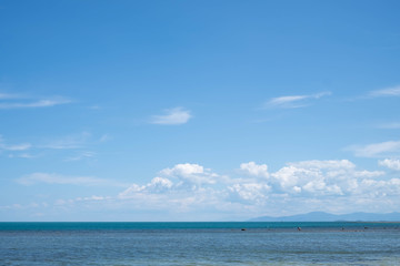 Fototapeta premium Blue Sky with White Clouds and Sea Background.