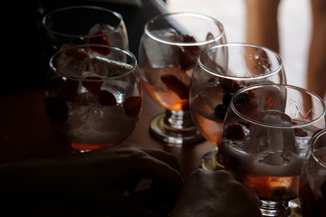 Cocktail with ice and fruits