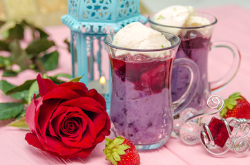 Mahalabia - Traditional Middle Eastern Dessert. Creamy dessert with berries and yogurt cream.