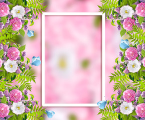 Beautiful floral garland consists of lilacs flowers, dog rose (briar), green leaves, blue butterflies and frame on blurred pink background. Copy space for photo or text.