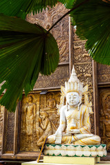 View of the statue in the courtyard of the Gangaramaya Temple, Colombo, Sri Lanka. Vertical. With selective focus.