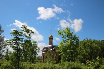 Spring landscape with a view of the temple-chapel in the city of Kanash