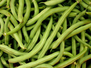 Pods of green asparagus beans as background