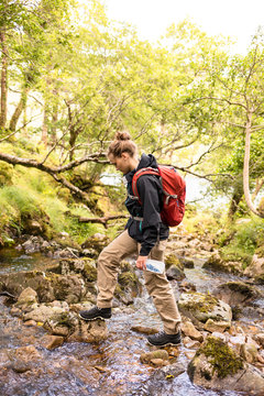 Glenveagh National Park, Donegal, Ireland: A woman with a water filter