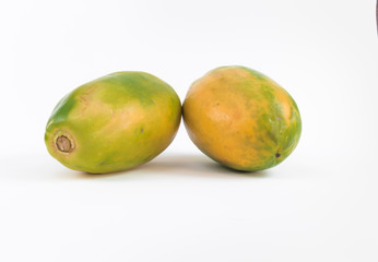 Two yellow and green papaya isolated on white background fresh papaya, pure vitamin